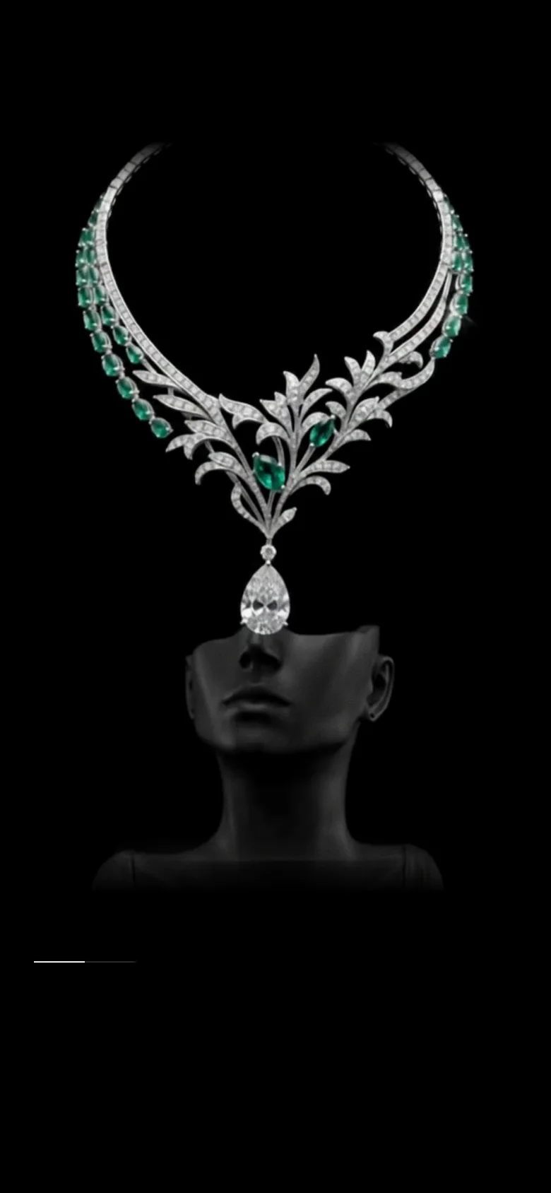 The interactive jewellery experience: an emerald necklace turning above a black bust, “Nothing is accidental.”